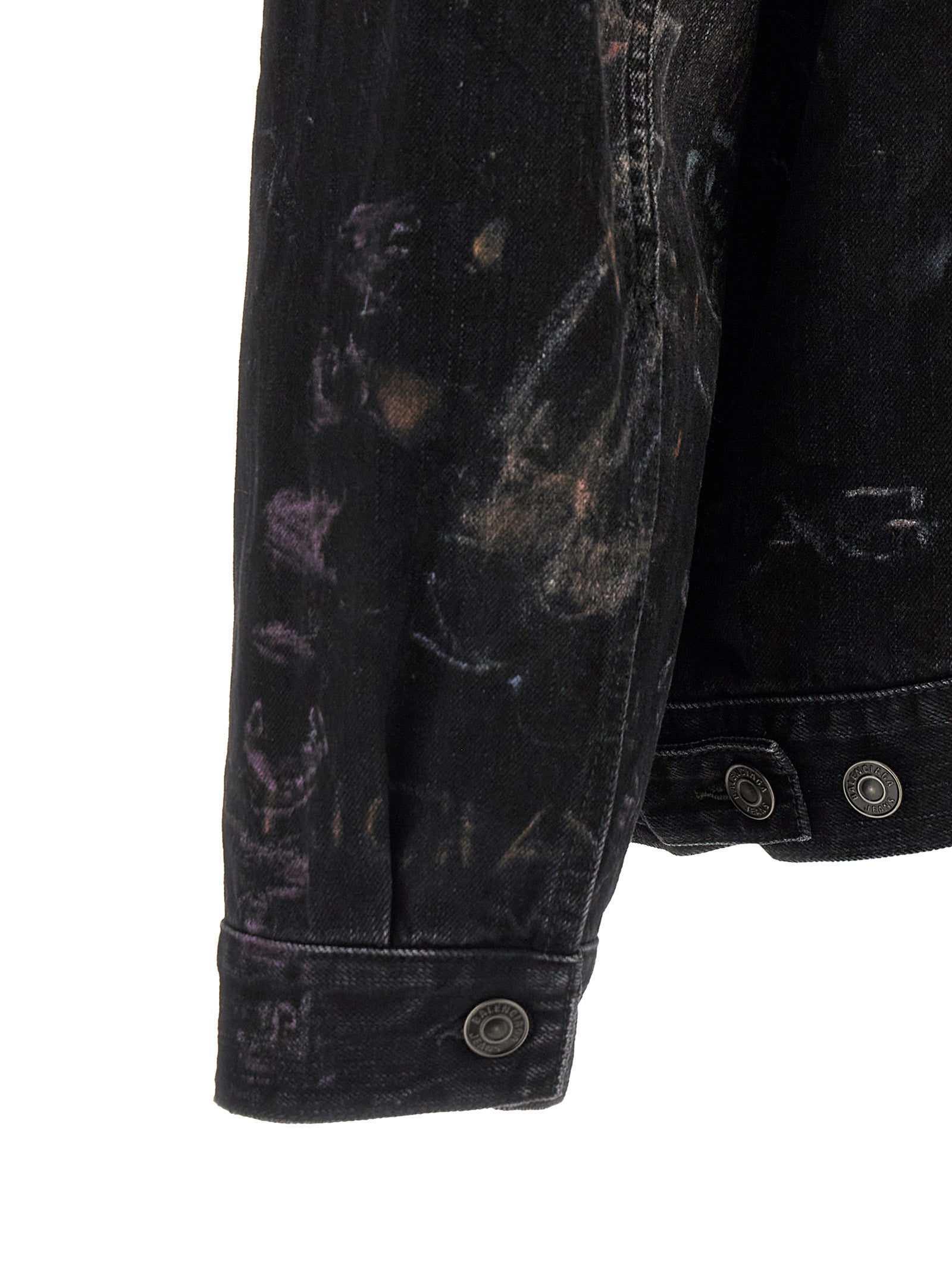 Veste en denim noir en coton de Balenciaga, coupe classique avec détails modernes, visible sur l'image.