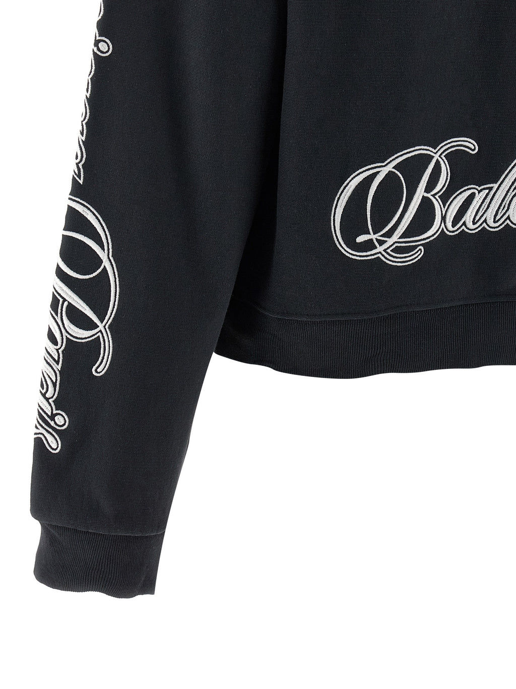 Sweatshirt en coton noir de Balenciaga, vêtement ample avec logo de la marque visible sur la poitrine.