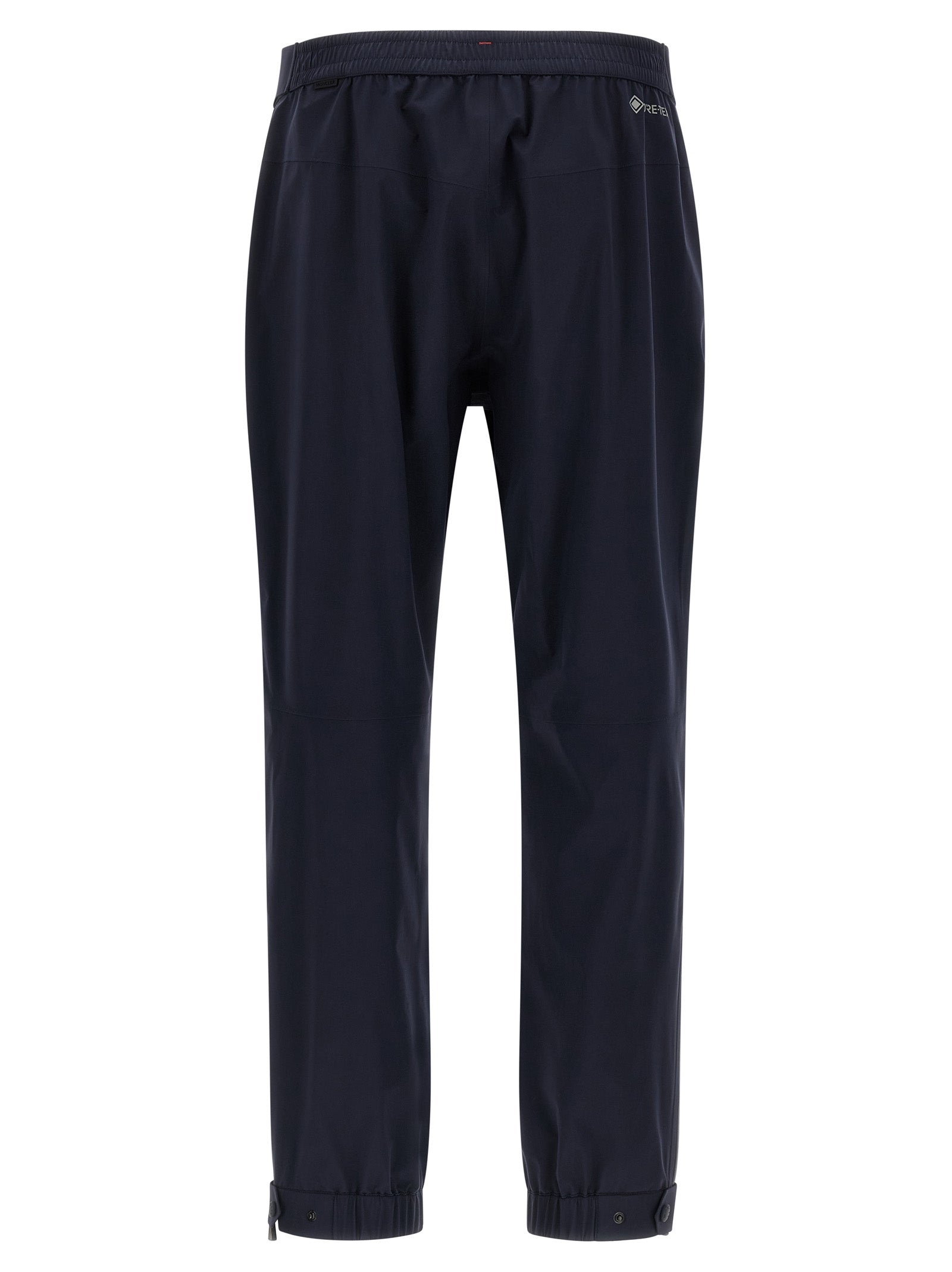 Pantalons de sport Moncler Grenoble en polyamide bleu, joggers de fitness pour homme, détails de couture et cordon de serrage.