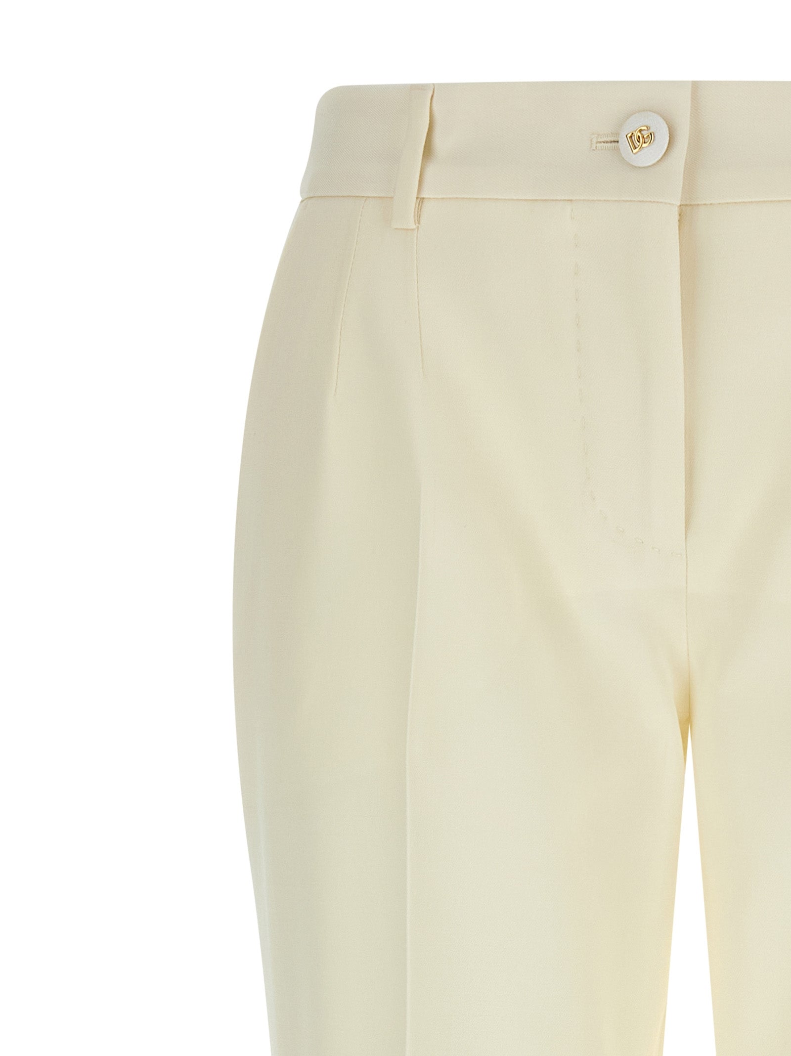 Pantalons de costume en laine vierge blanche Dolce & Gabbana pour femme, coupe élégante et tissu de haute qualité.