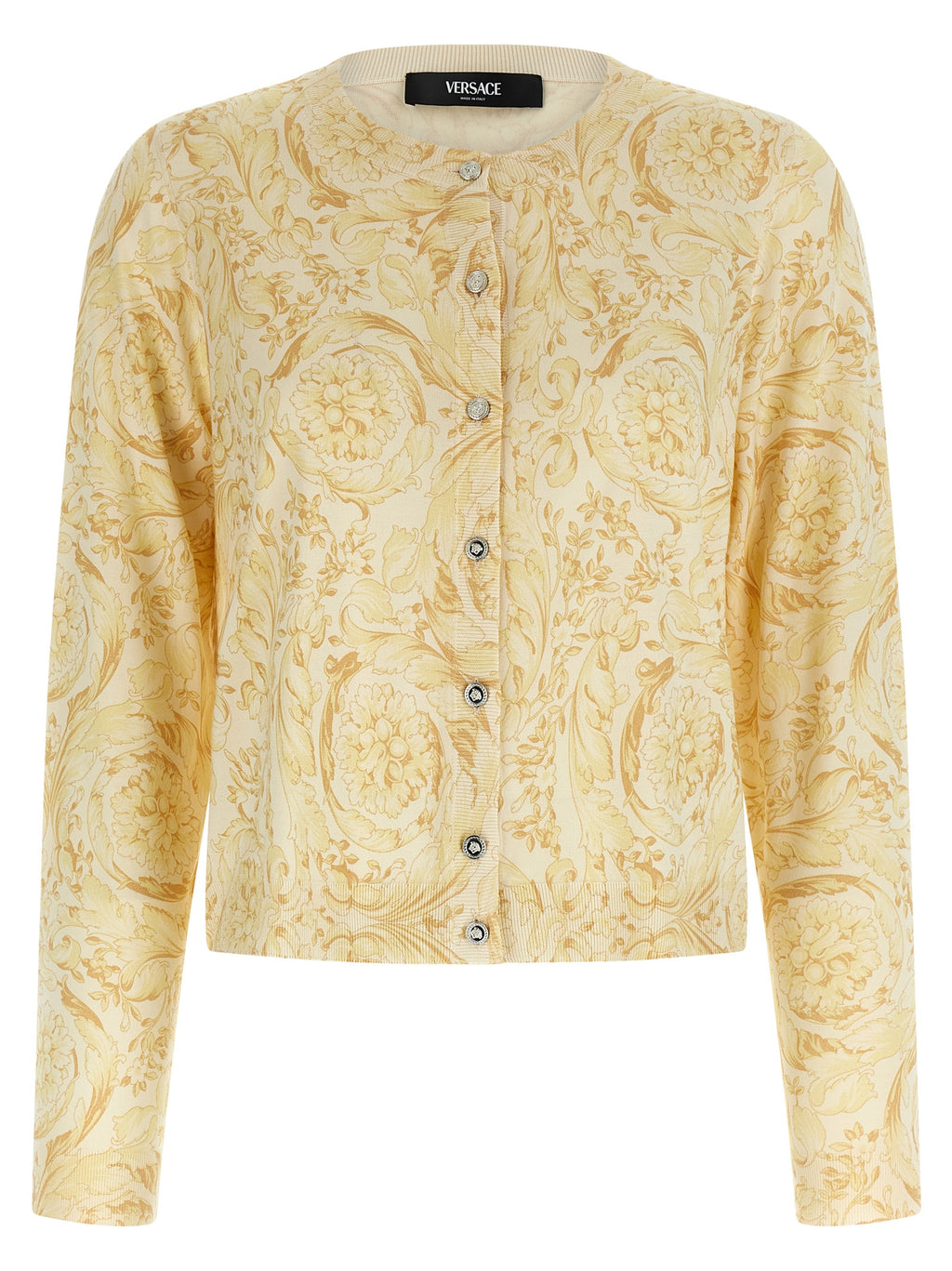 Cardigan en soie bicolore Versace avec motifs élégants, porté sur un mannequin, mettant en valeur le tissu luxueux et le design sophistiqué.