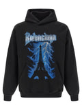 Sweat-shirt noir en coton de Balenciaga, coupe décontractée, avec logo discret en contraste, porté sur mannequin.
