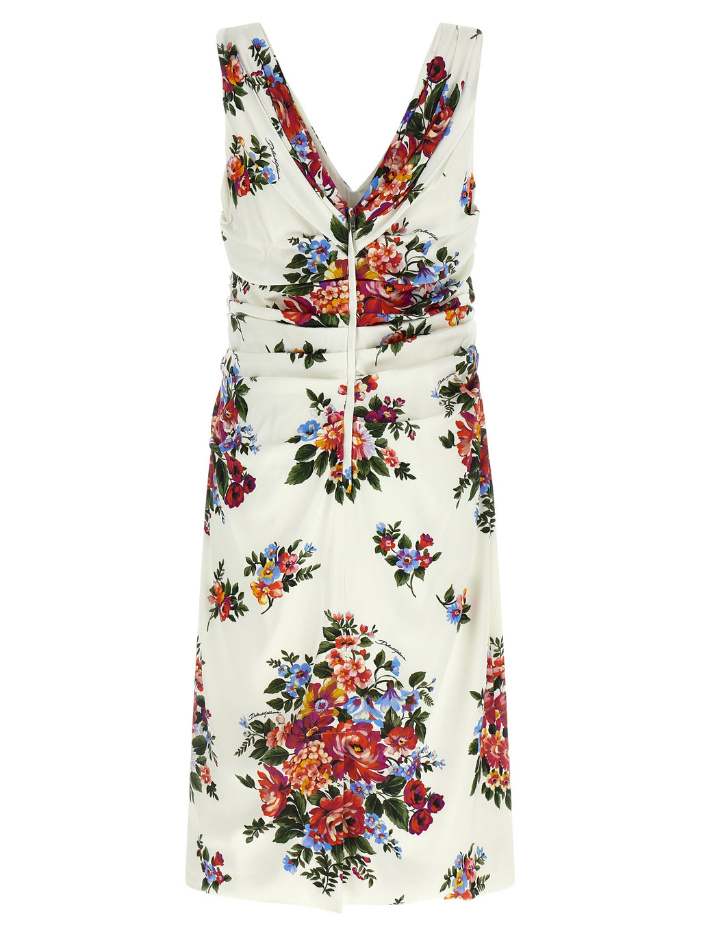 Robe midi en viscose blanche de Dolce & Gabbana, silhouette élégante et fluide, portée avec des détails sophistiqués.