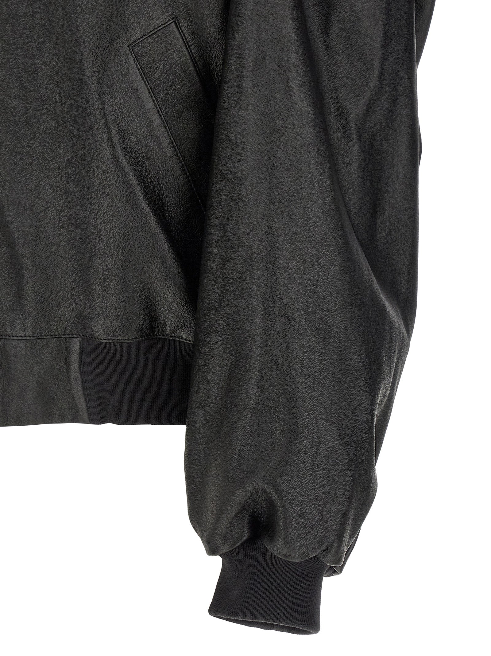 Veste en cuir d'agneau noir de Balenciaga, style élégant avec détails modernes et coupe ajustée.