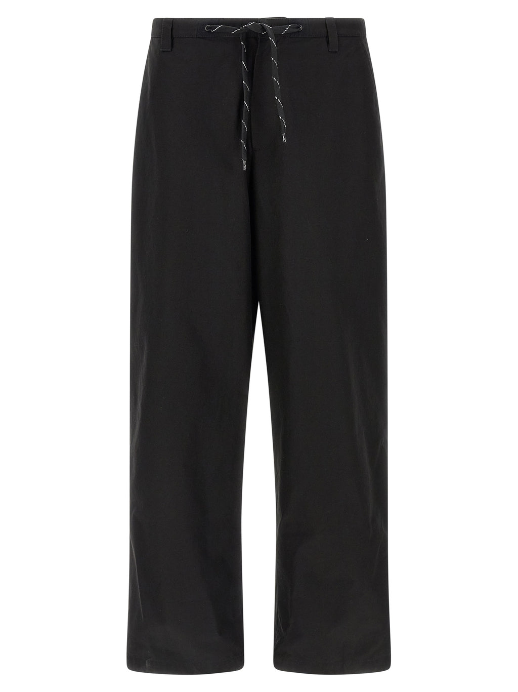 Pantalon chino en coton noir de Balenciaga, coupe classique, détails élégants, porté sur mannequin.