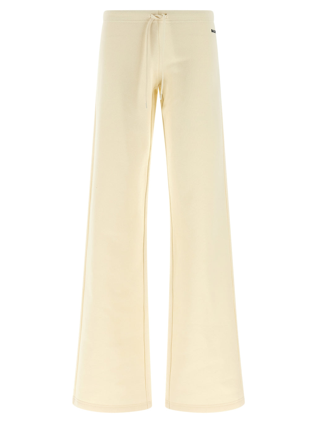 Pantalons évasés blancs en coton de la marque Balenciaga, vue en détail sur un fond neutre.