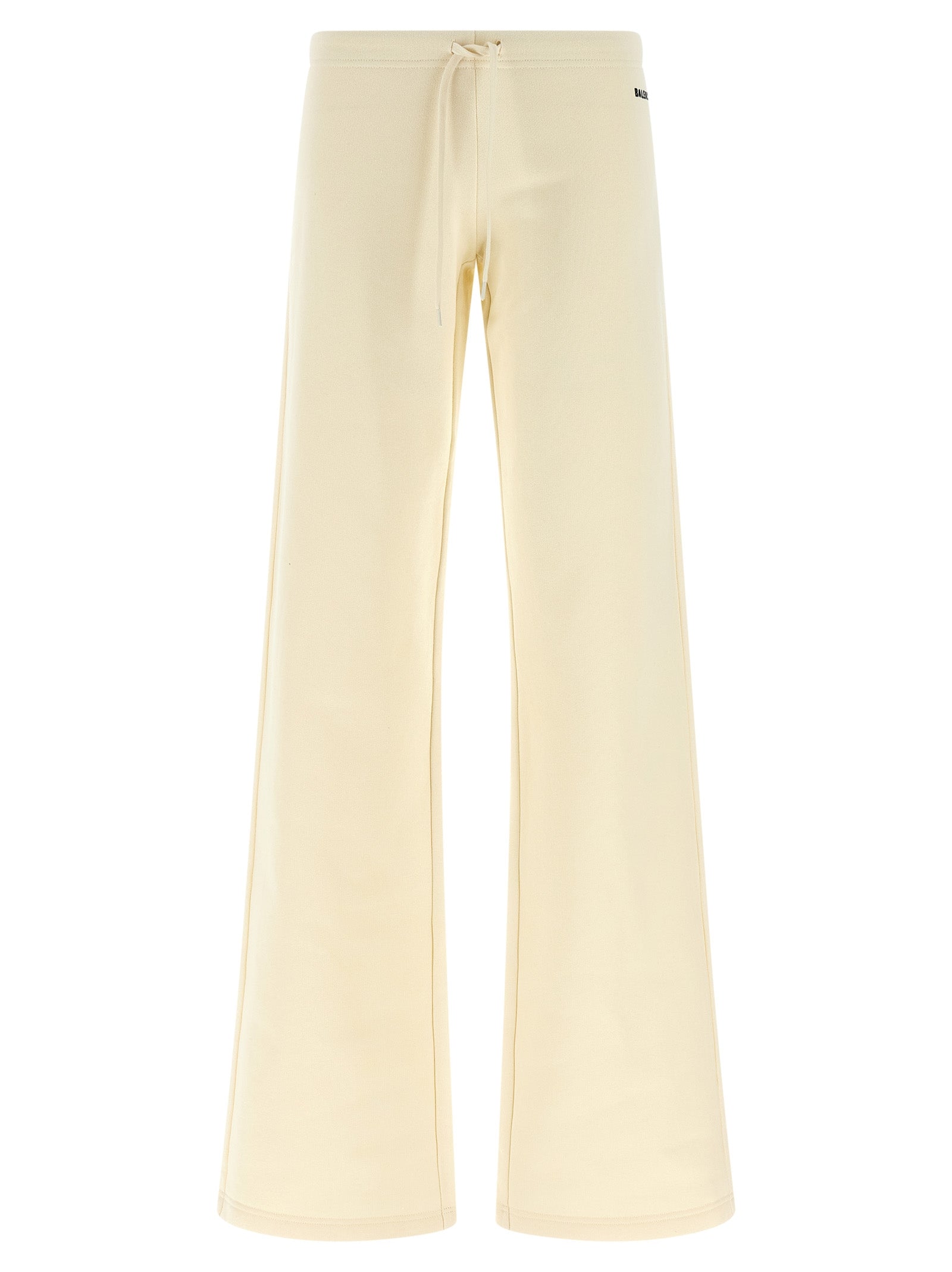 Pantalons évasés blancs en coton de la marque Balenciaga, vue en détail sur un fond neutre.