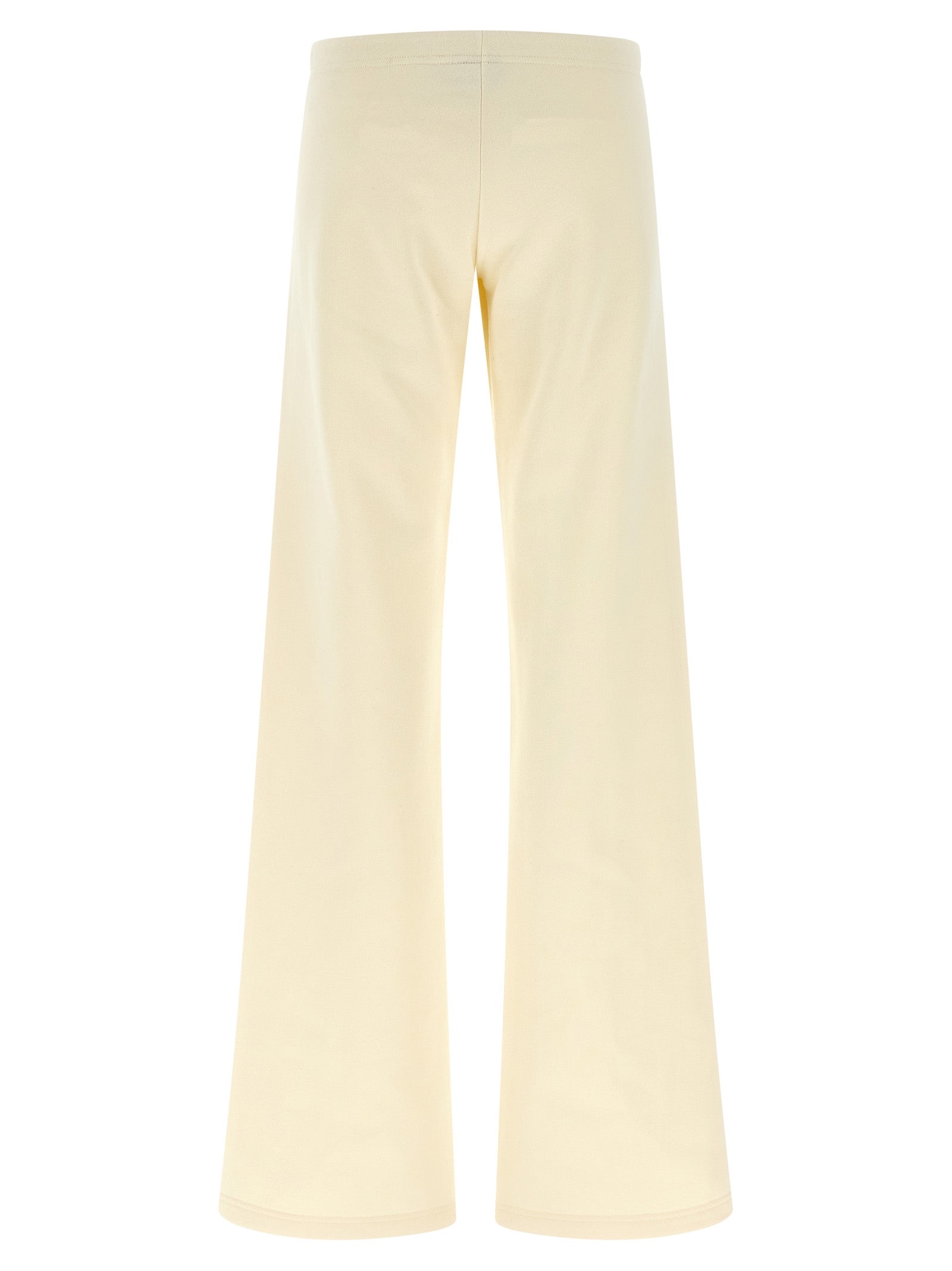 Pantalon évasé blanc en coton de la marque Balenciaga, vue en gros plan avec détail du tissu et de la coupe.