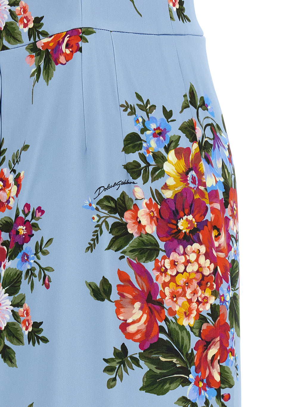 Robe midi en viscose bleue de Dolce & Gabbana, élégante avec un design fluide et sophistiqué, portée avec style.