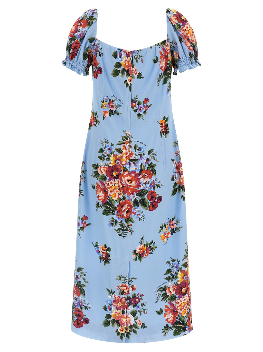 Robe midi en soie bleue de Dolce & Gabbana, élégante et fluide, avec un design sophistiqué et un tissu brillant visible dans l’image.