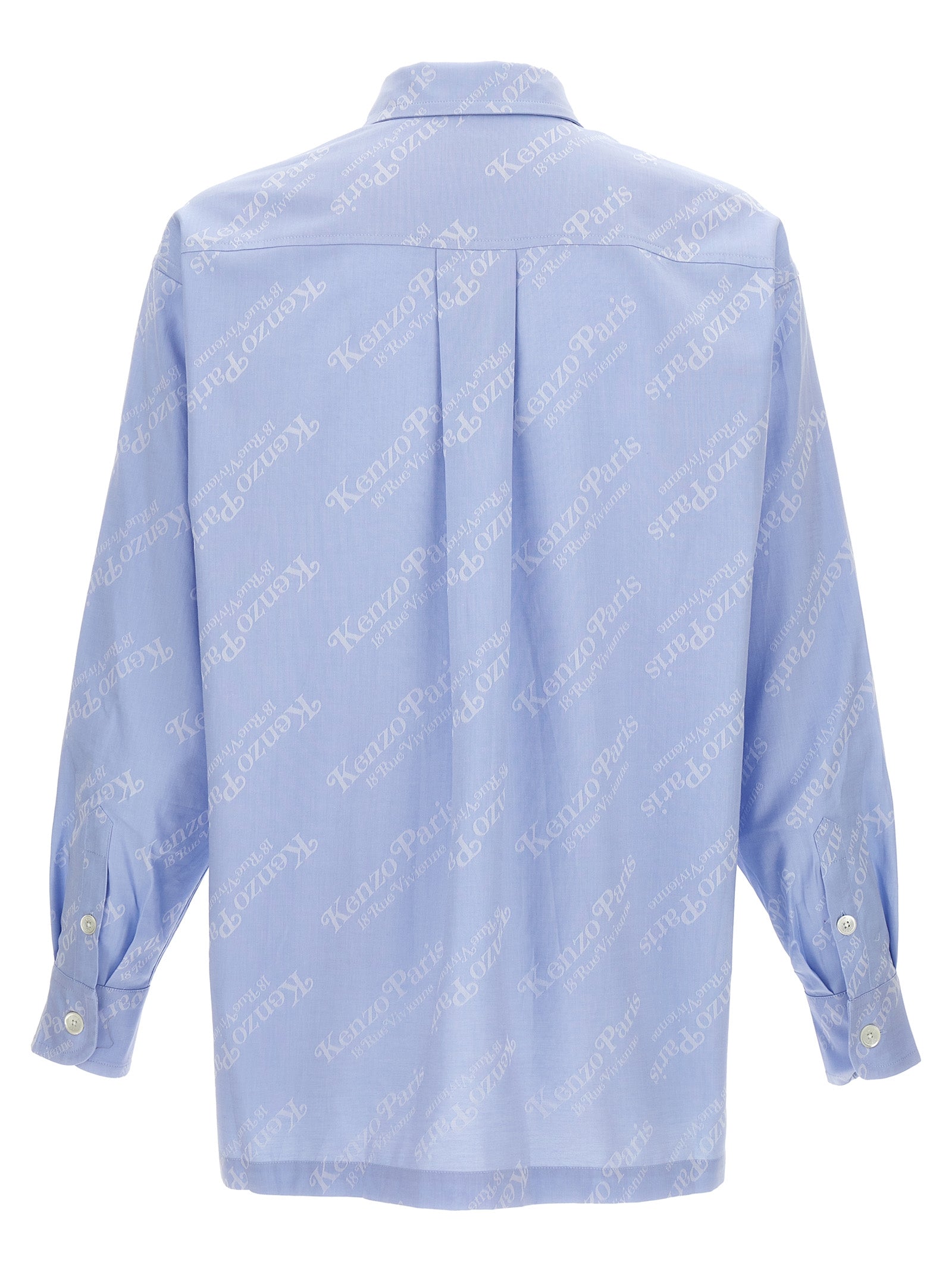 Chemisier en coton bleu de la marque Kenzo, détails du tissu et coupe élégante visible sur l'image.