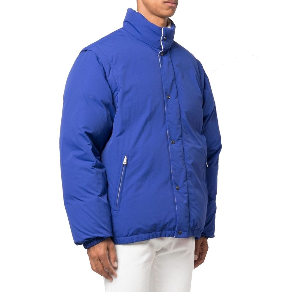 Veste longue Gucci en polyamide bleue, style moderne avec fermeture éclair et col montant, vue de face.