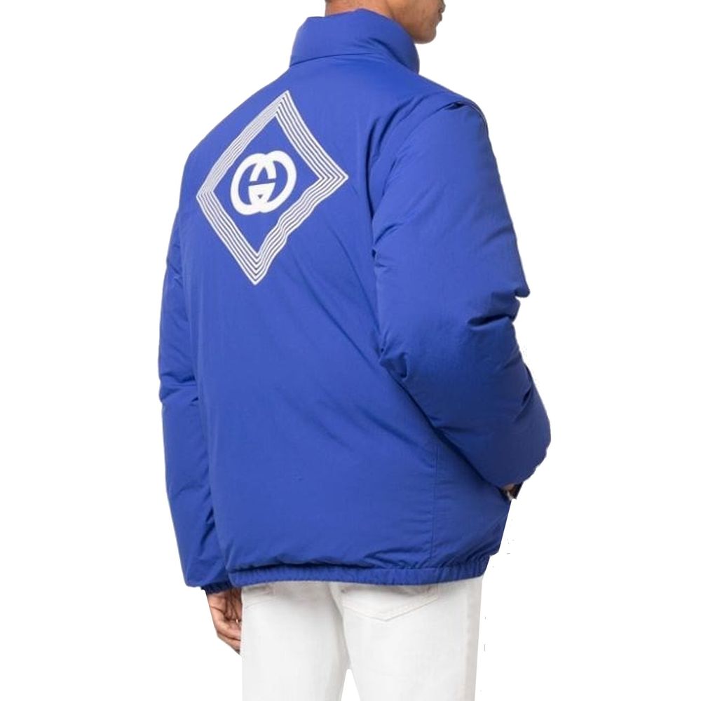 Veste longue en polyamide bleu Gucci, style décontracté avec fermeture éclair et col montant, vue de face.