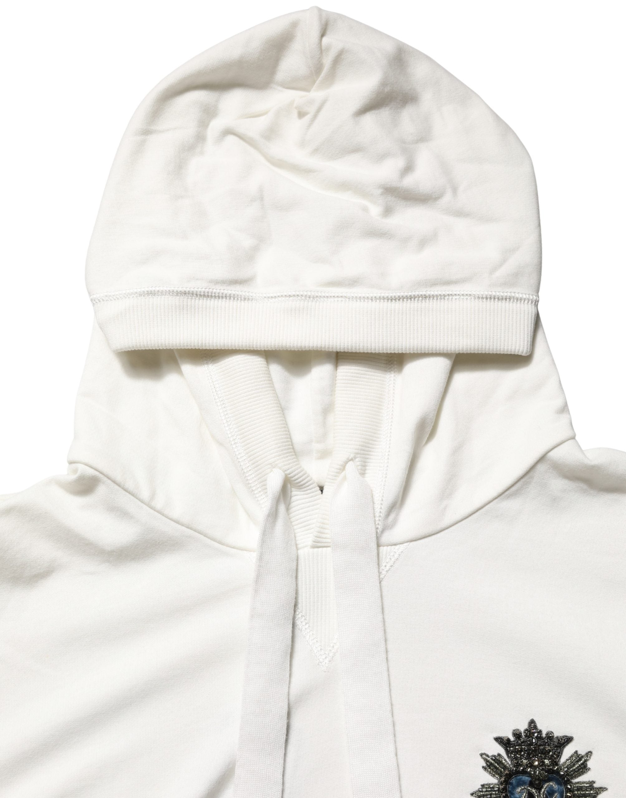Sweat à capuche en coton blanc de Dolce & Gabbana, pull décontracté avec capuche et logo discret, porté sur un mannequin.