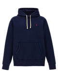 Sweatshirt en coton bleu de Polo Ralph Lauren, style décontracté avec col rond et logo brodé, porté sur un mannequin.