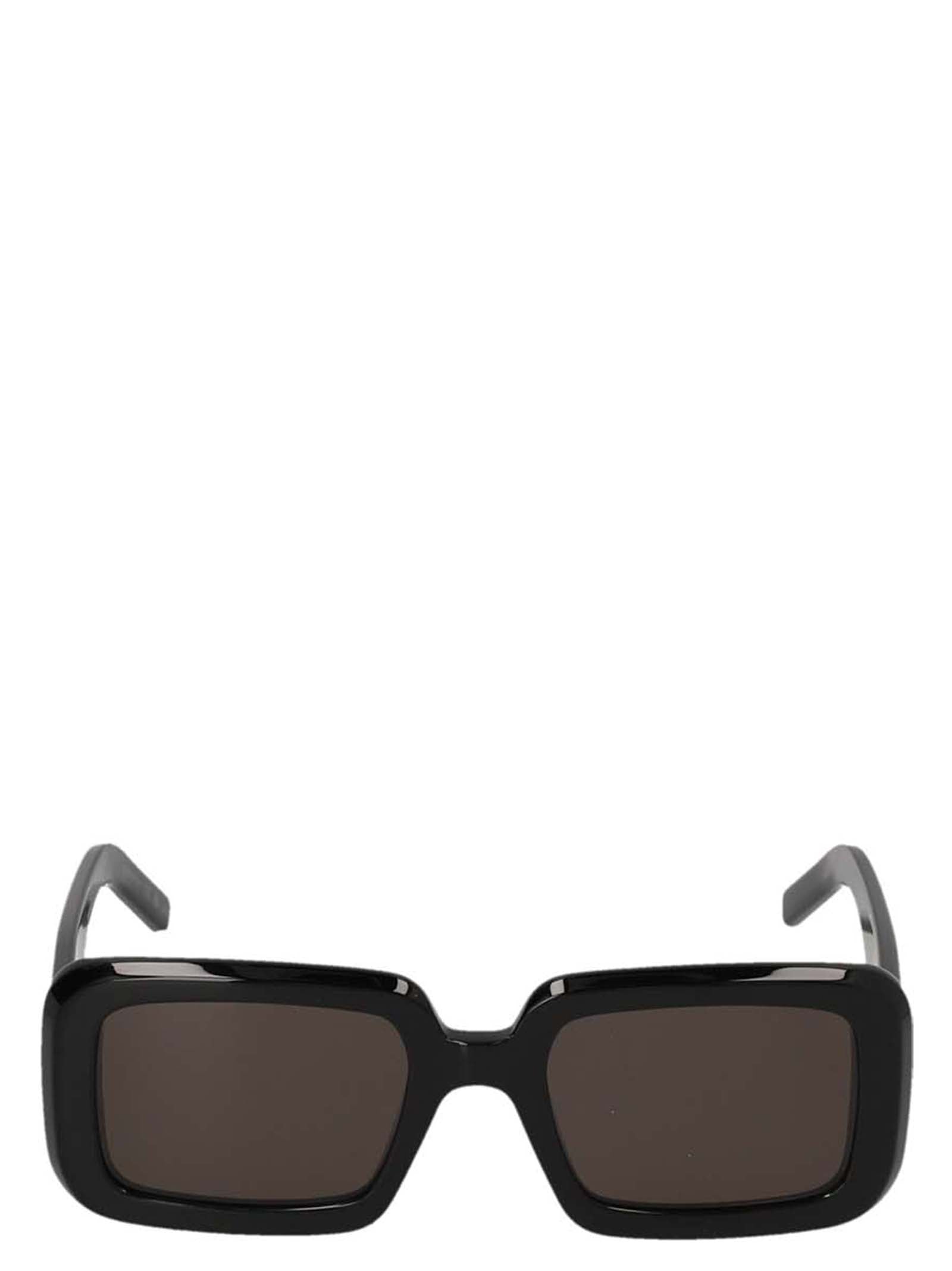 Lunettes de soleil noires en acétate de la marque Saint Laurent, style élégant et moderne.