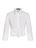 Blouse en coton blanc Dolce & Gabbana, style élégant avec détails raffinés, vue de face sur modèle féminin.