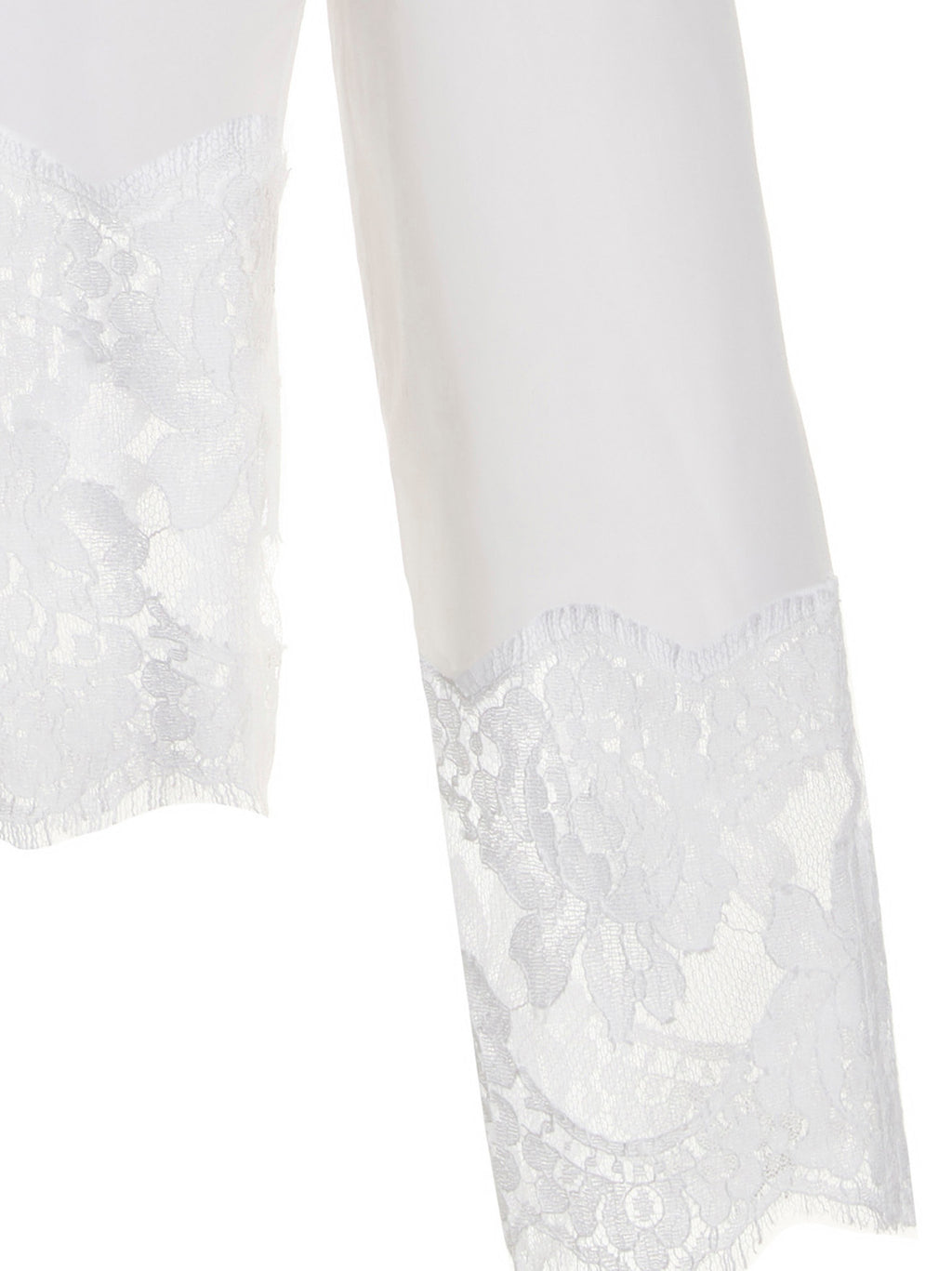 Chemise en coton blanc Dolce & Gabbana, élégante avec détails sophistiqués, portée sur un mannequin.