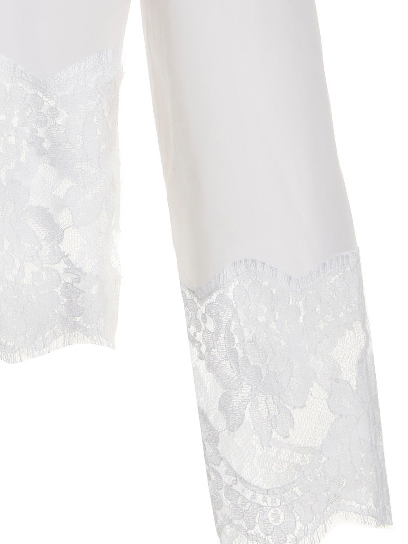 Chemise en coton blanc Dolce & Gabbana, élégante avec détails sophistiqués, portée sur un mannequin.