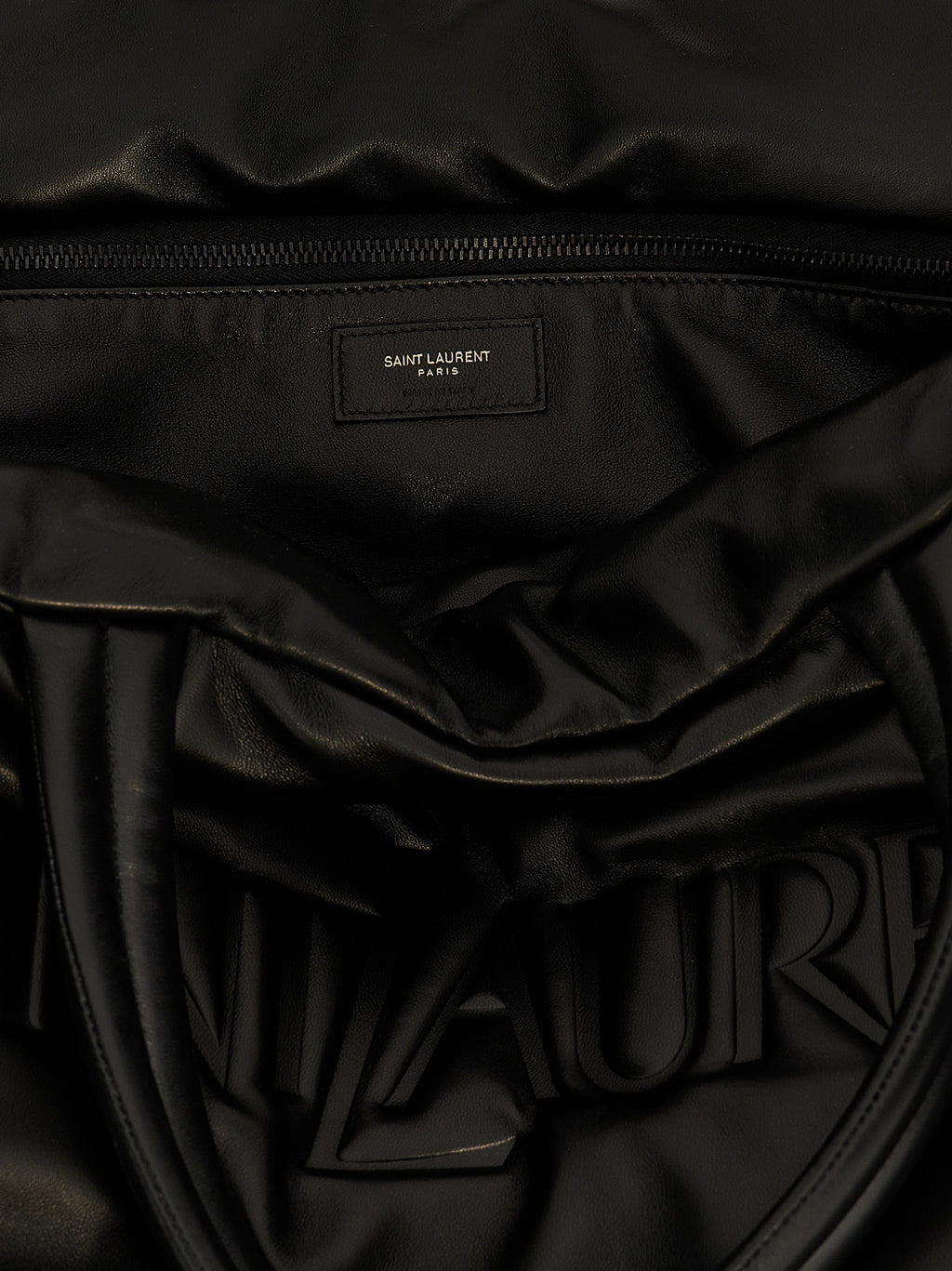 Sac à main tote en cuir d'agneau noir de Saint Laurent, élégant et sophistiqué, avec poignées en cuir et logo discret.
