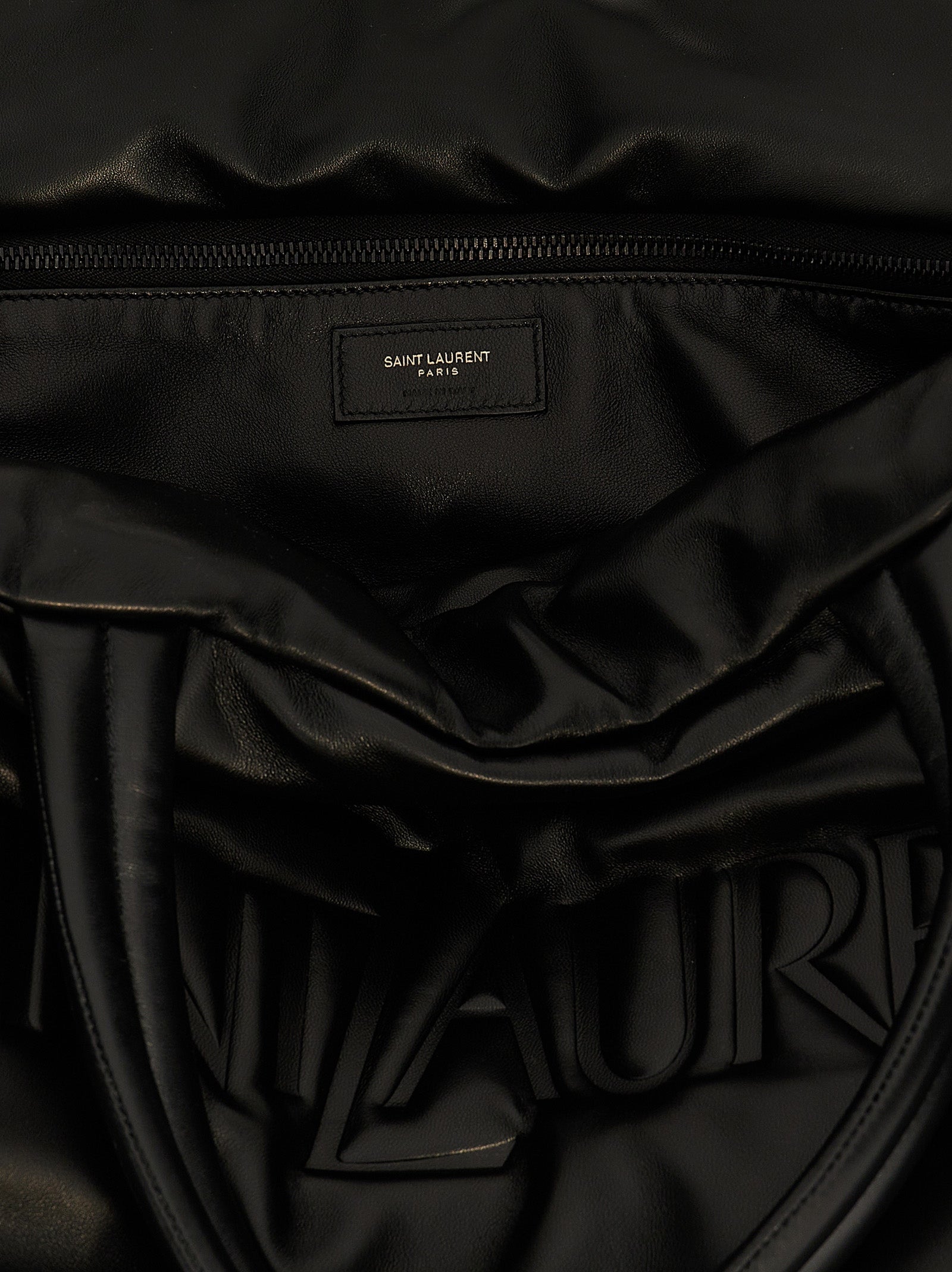 Sac à main tote en cuir d'agneau noir de Saint Laurent, élégant et sophistiqué, avec poignées en cuir et logo discret.