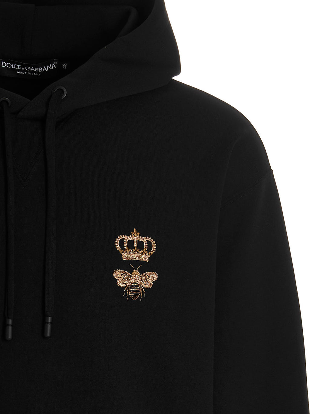 Sweatshirt en coton noir Dolce & Gabbana, coupe décontractée, logo discret sur la poitrine, porté sur un mannequin.