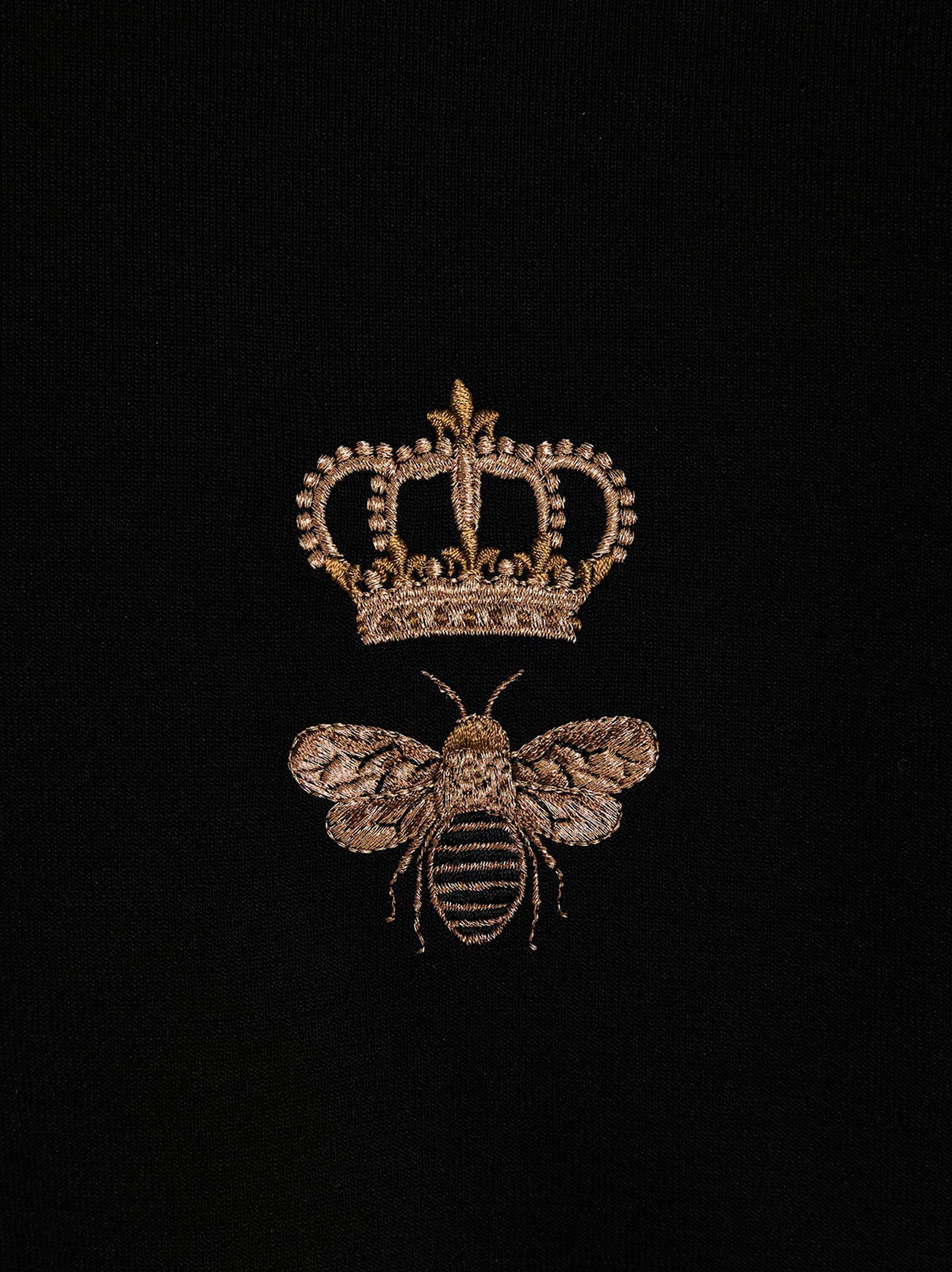 Sweatshirt en coton noir de la marque Dolce & Gabbana, vue de face, avec logo discret, pour un style décontracté et chic.