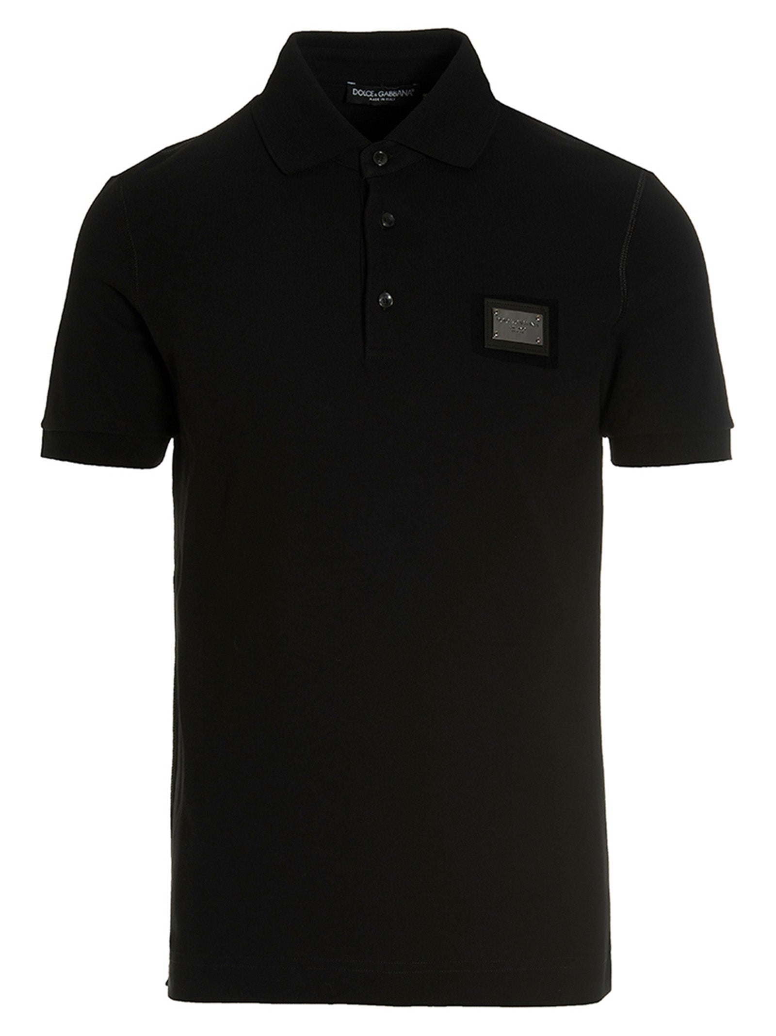 Chemise polo noire en coton de Dolce & Gabbana, style élégant avec col et boutons visibles.