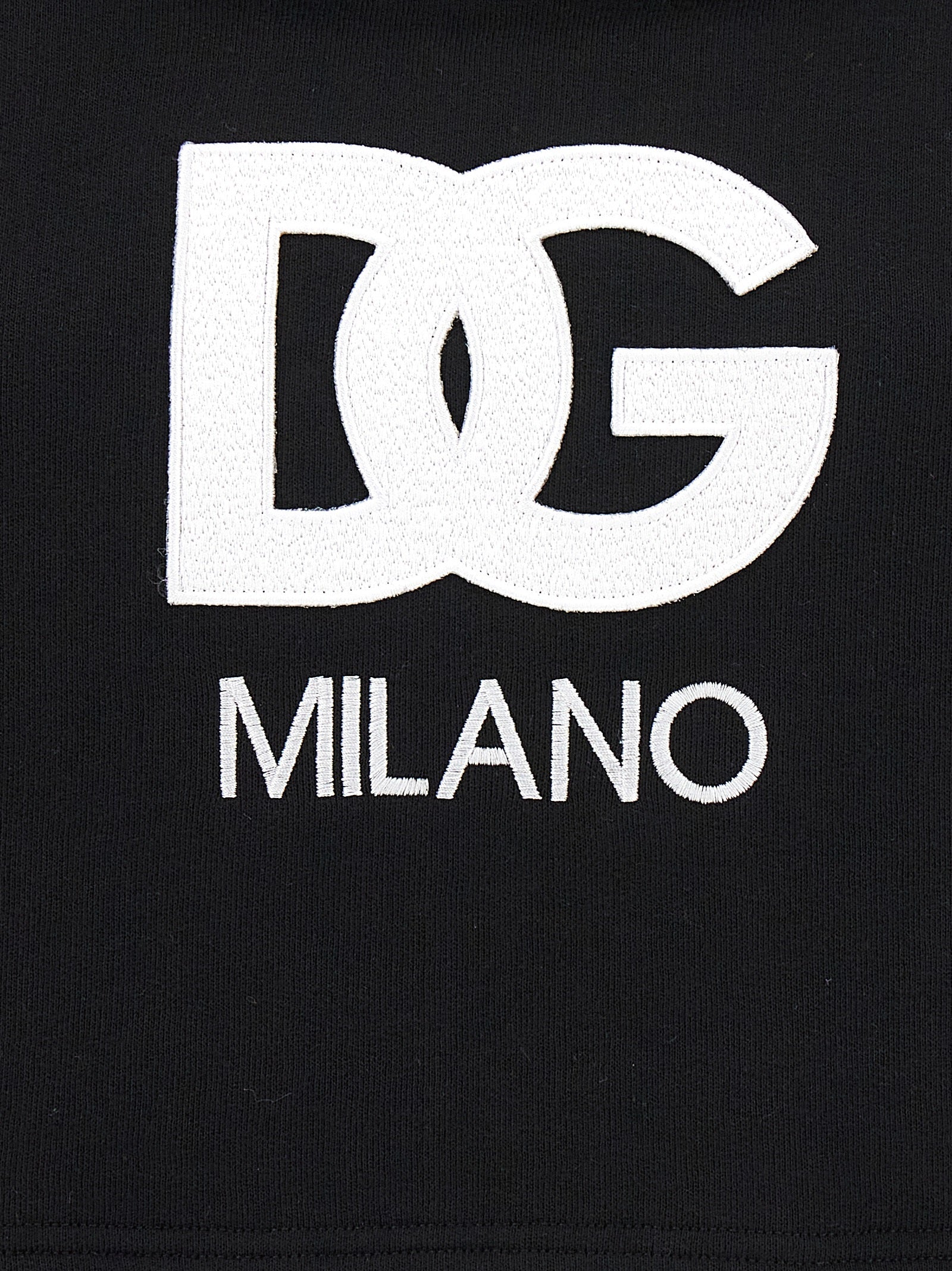 Sweat à capuche en coton noir de Dolce & Gabbana, vue de face, avec logo brodé sur la poitrine, tissu doux et confortable.