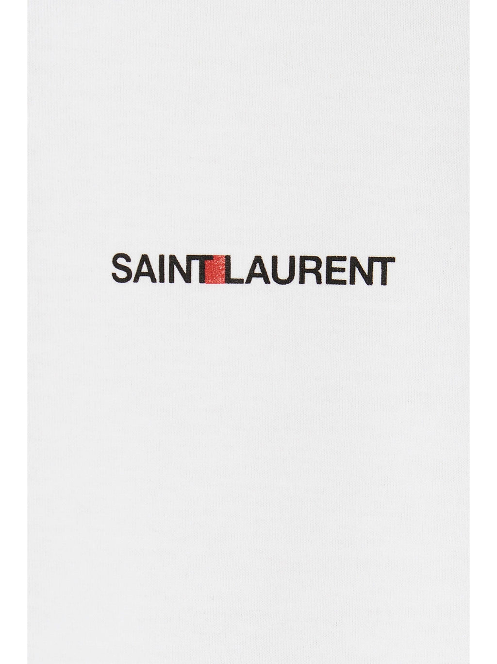 T-shirt en coton blanc de Saint Laurent, vêtement décontracté avec logo discret, porté sur un mannequin.