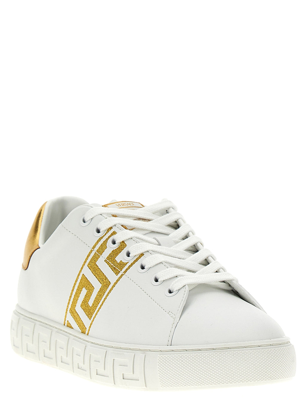 Chaussures basses Versace en polyamide doré, sneakers low top avec logo emblématique, design élégant et moderne.