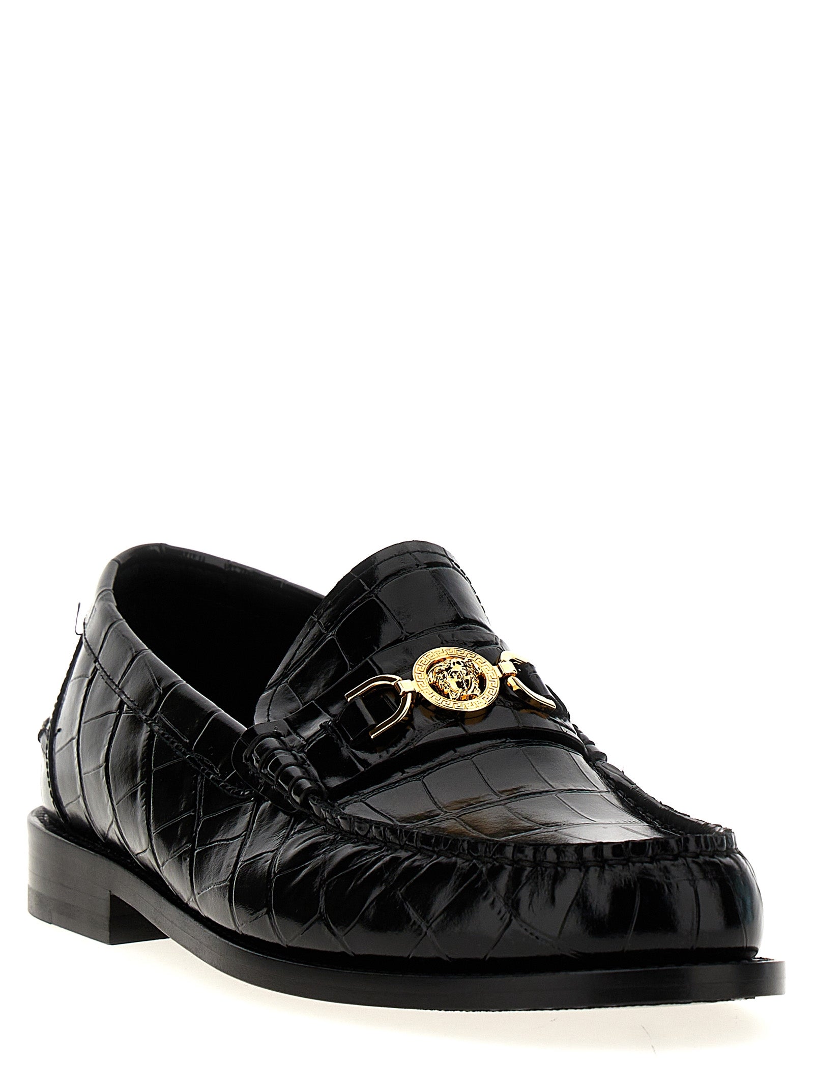 Chaussures mocassins en velours noir et cuir de Versace, slip-on élégants pour hommes avec logo distinctif.