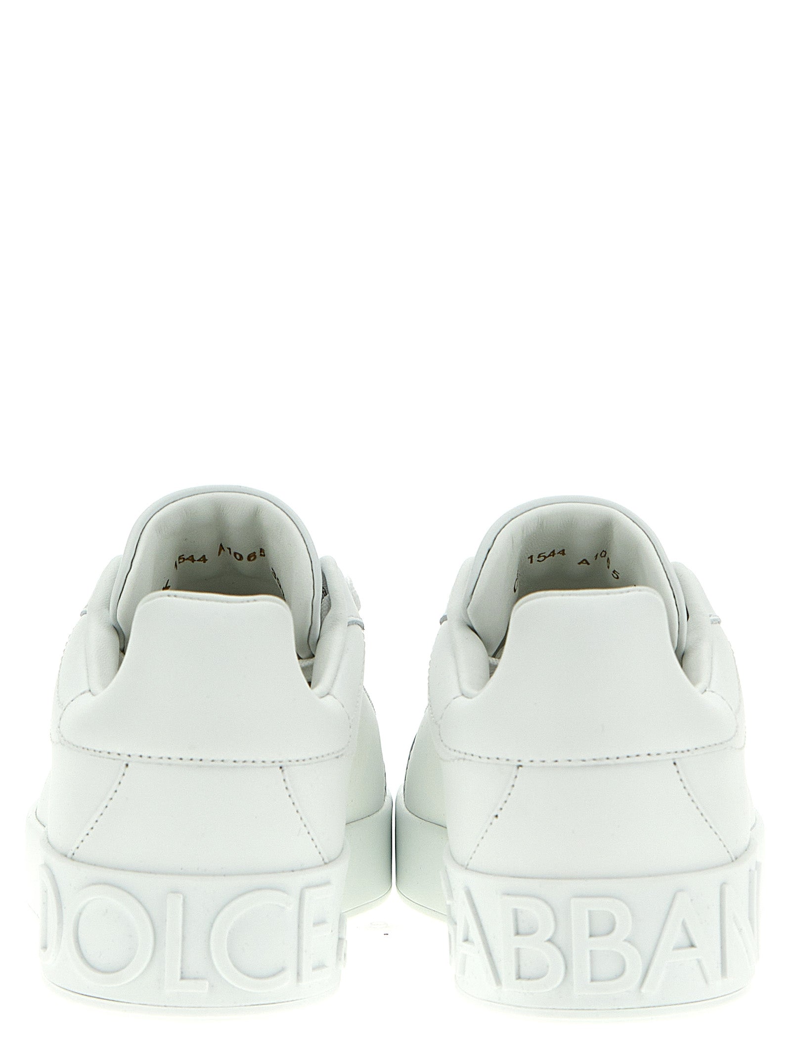 Baskets basses en cuir de veau blanc de Dolce & Gabbana, style décontracté et élégant pour hommes et femmes.
