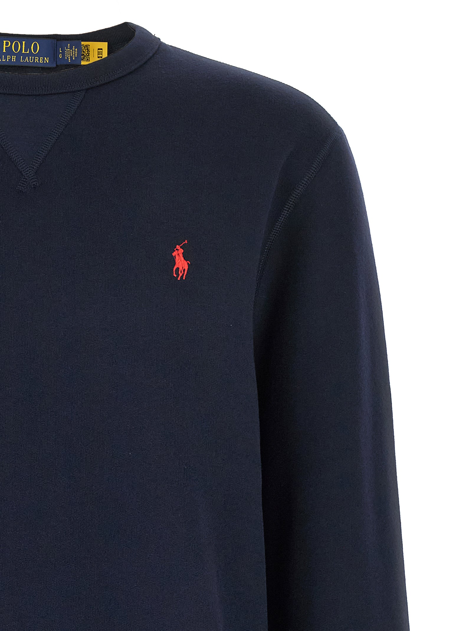 Sweat-shirt en coton bleu Polo Ralph Lauren avec col rond et logo brodé sur la poitrine, porté sur un mannequin.