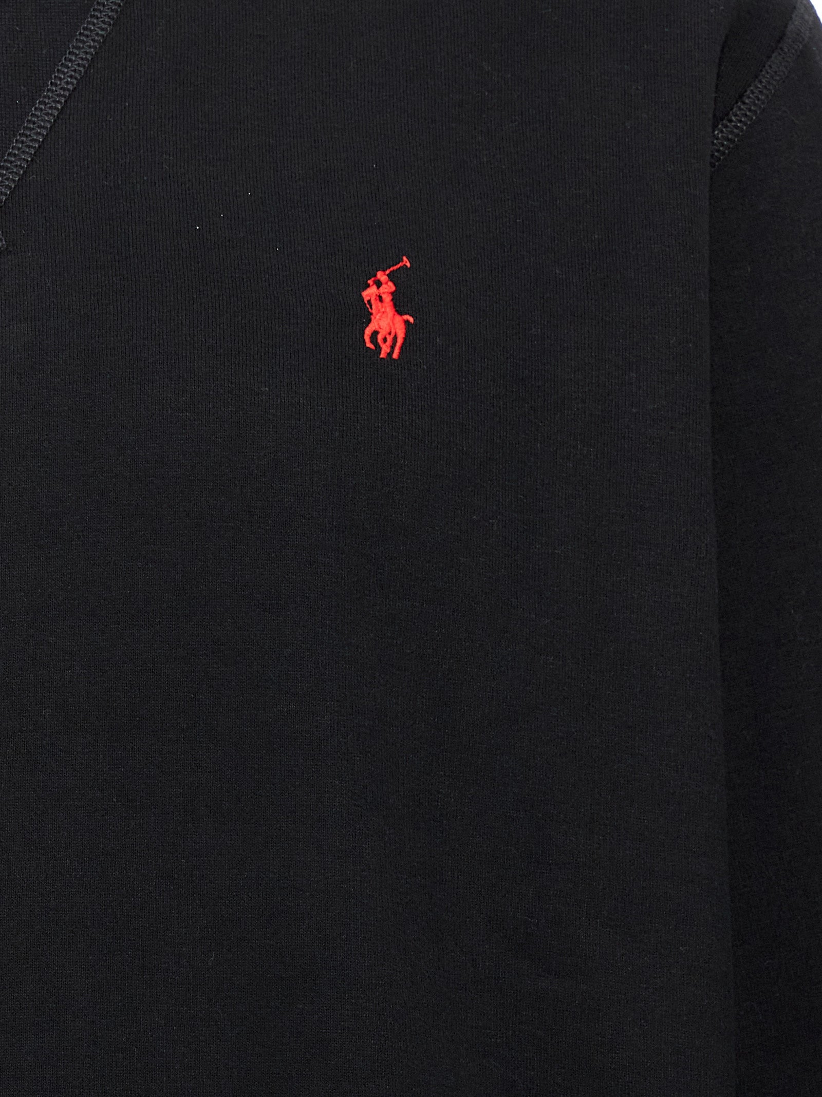Sweat-shirt noir en coton de Polo Ralph Lauren, coupe décontractée avec col rond, logo emblématique sur la poitrine.