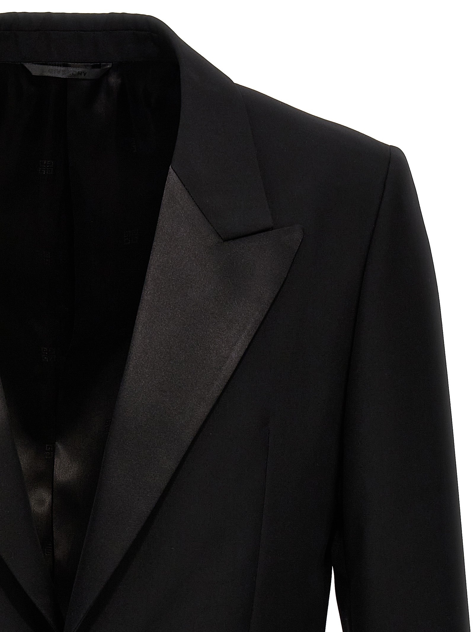 Blazer en laine noir Givenchy, veste élégante pour homme ou femme, avec coupe classique et détails sophistiqués.