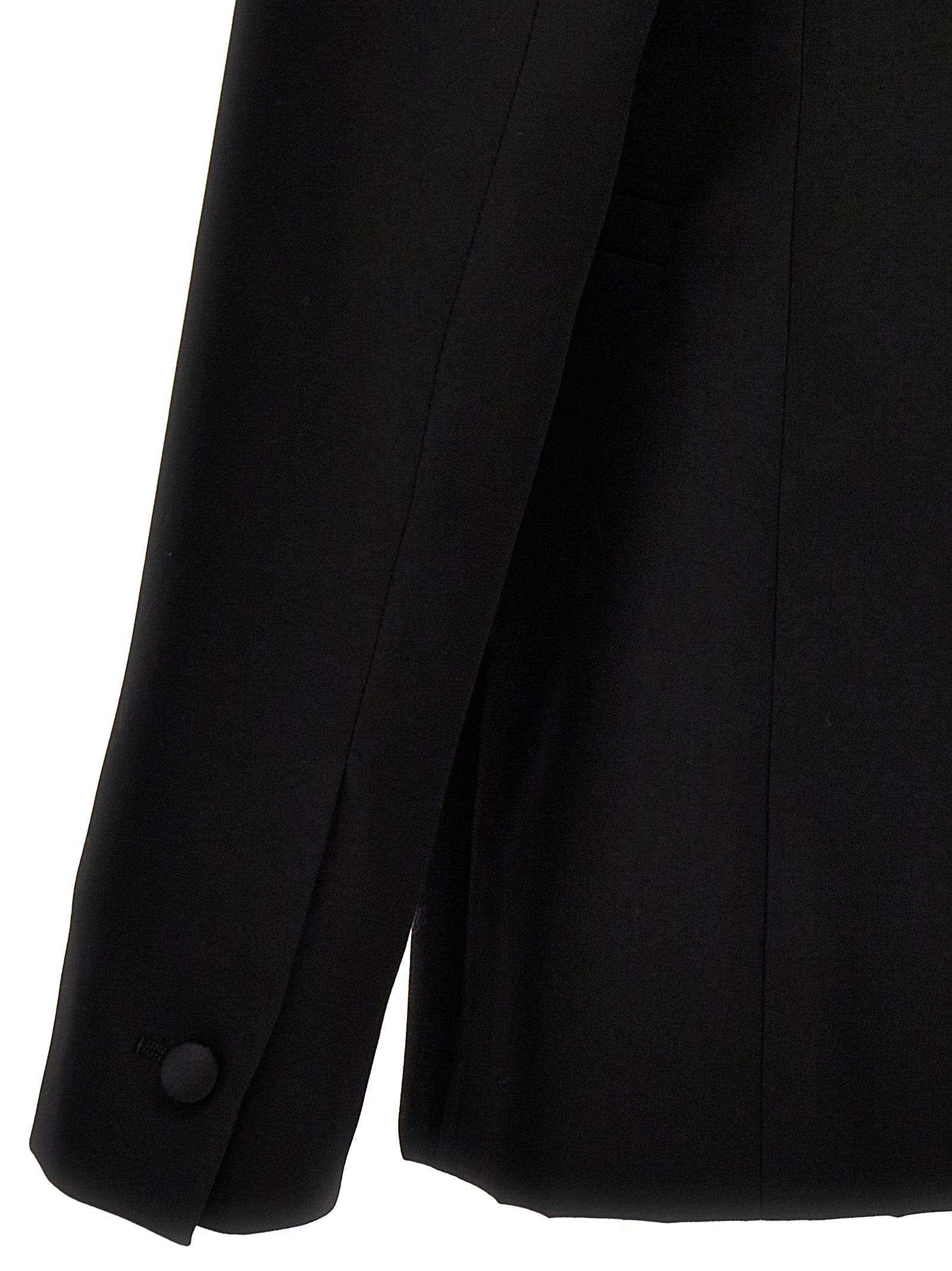 Veste blazer en laine noire de Givenchy, élégante et ajustée, avec col classique et boutons en détail.