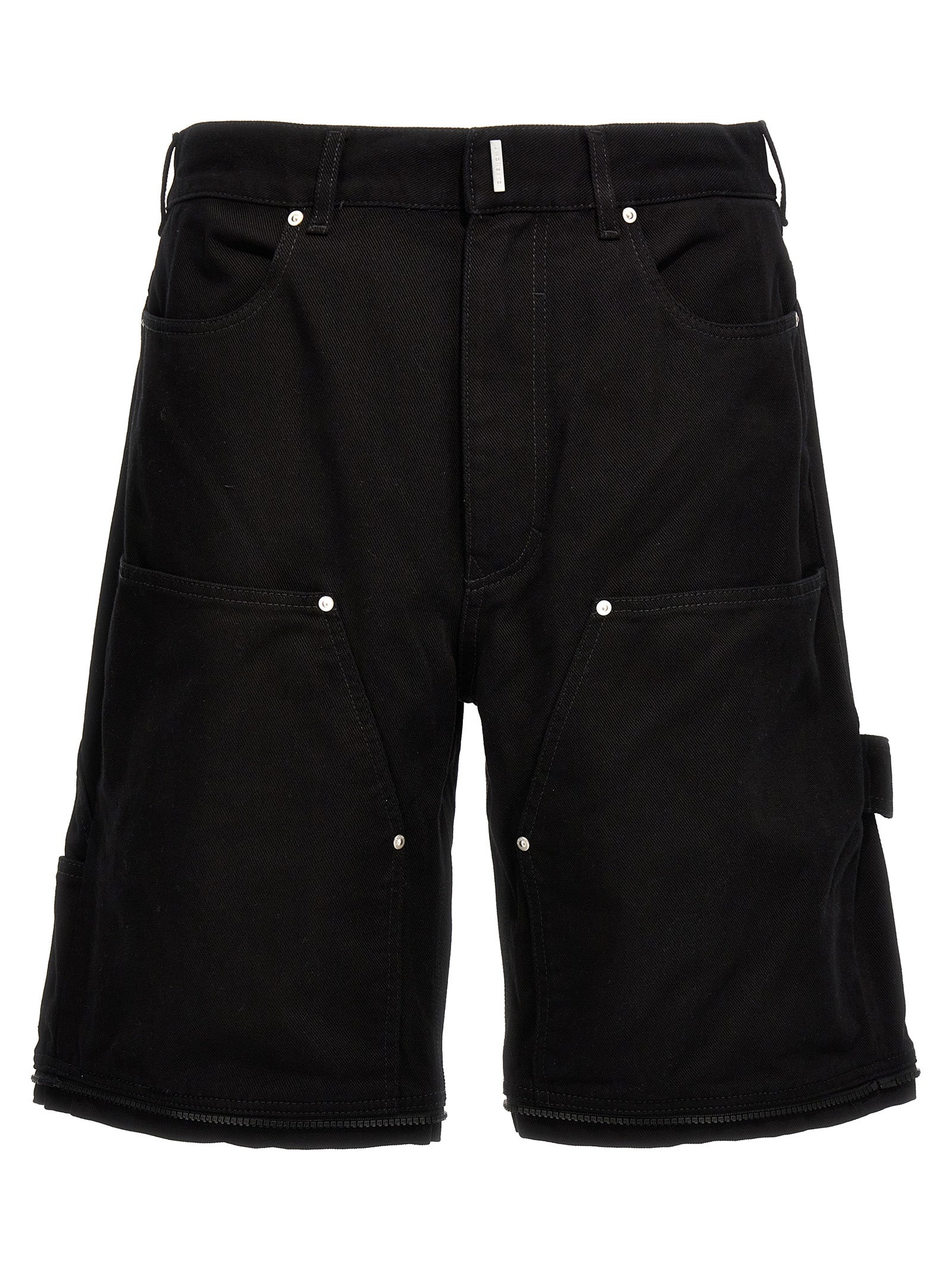Jeans en denim noir Givenchy en coton, coupe classique avec détails modernes, visible en gros plan sur le tissu et la finition.