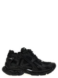 Sneakers de sport en polyester noir Balenciaga, chaussures athlétiques modernes avec design tendance et semelle blanche.