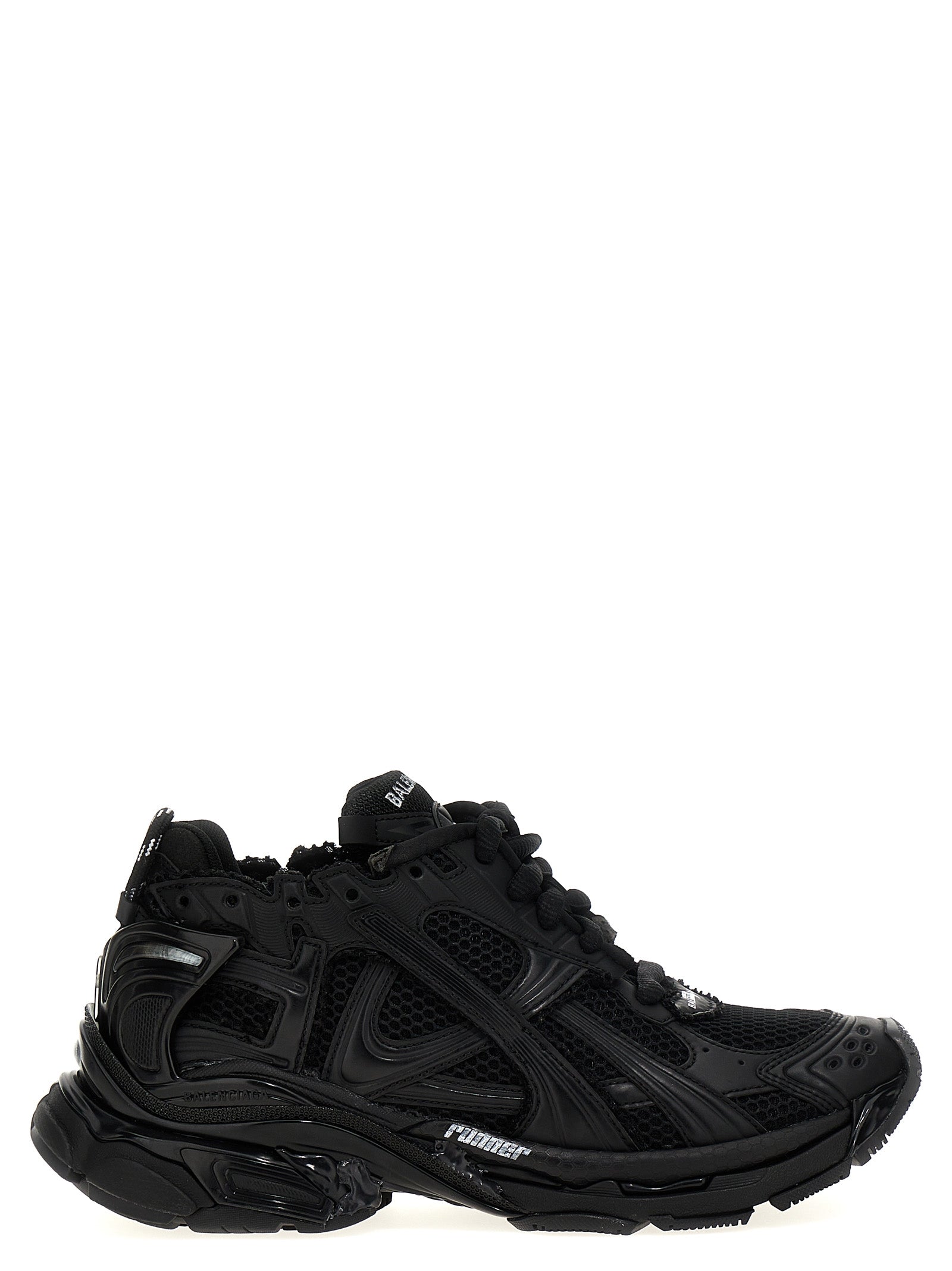 Sneakers de sport en polyester noir Balenciaga, chaussures athlétiques modernes avec design tendance et semelle blanche.