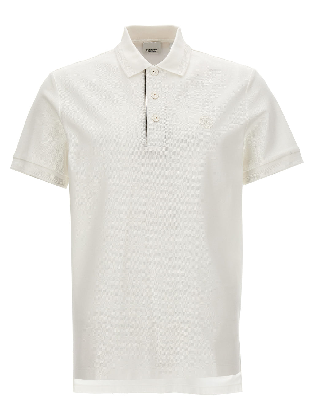 Chemise polo blanche en coton de la marque Burberry, affichant un col classique et le logo emblématique sur la poitrine.