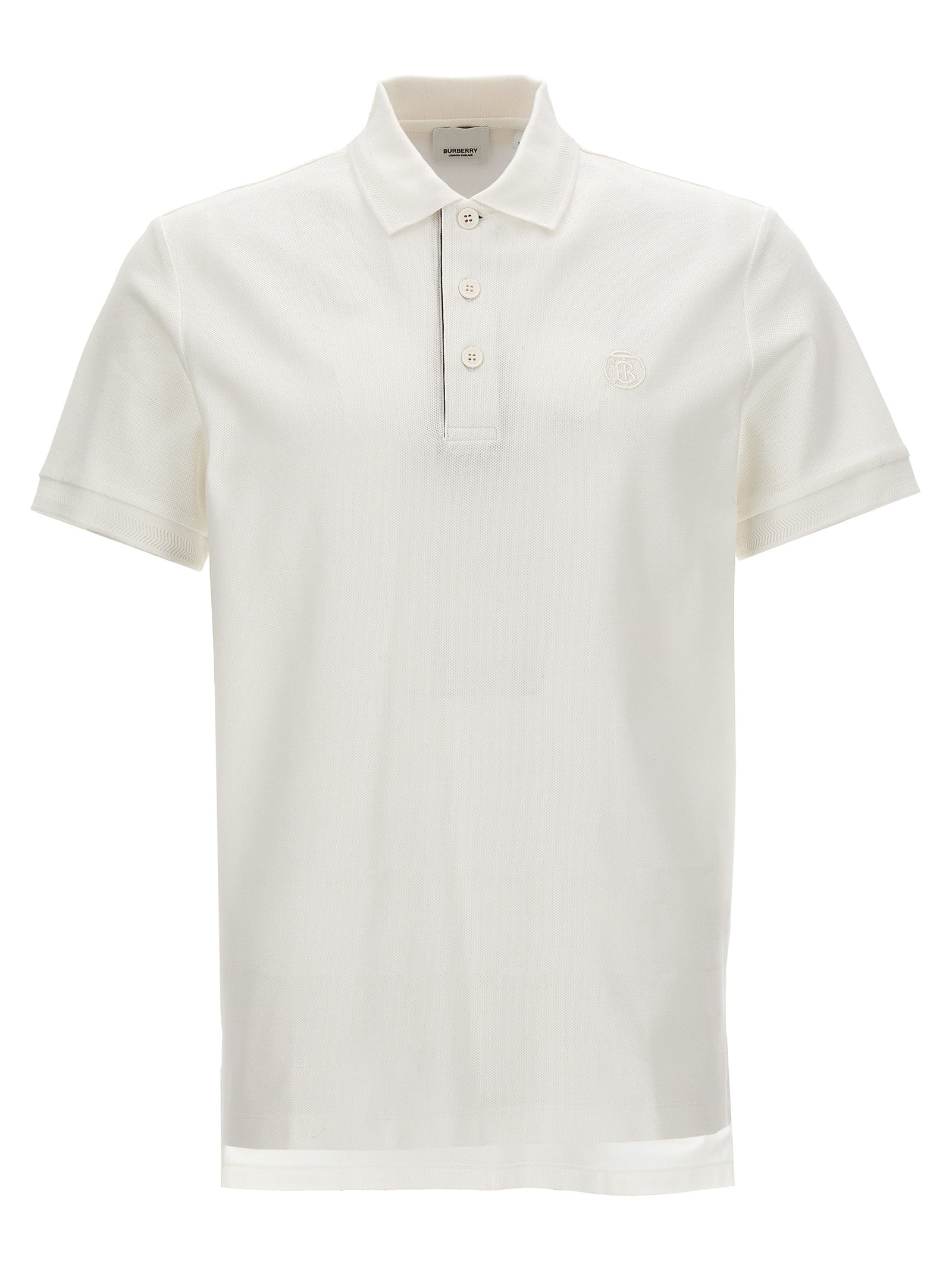 Chemise polo blanche en coton de la marque Burberry, affichant un col classique et le logo emblématique sur la poitrine.