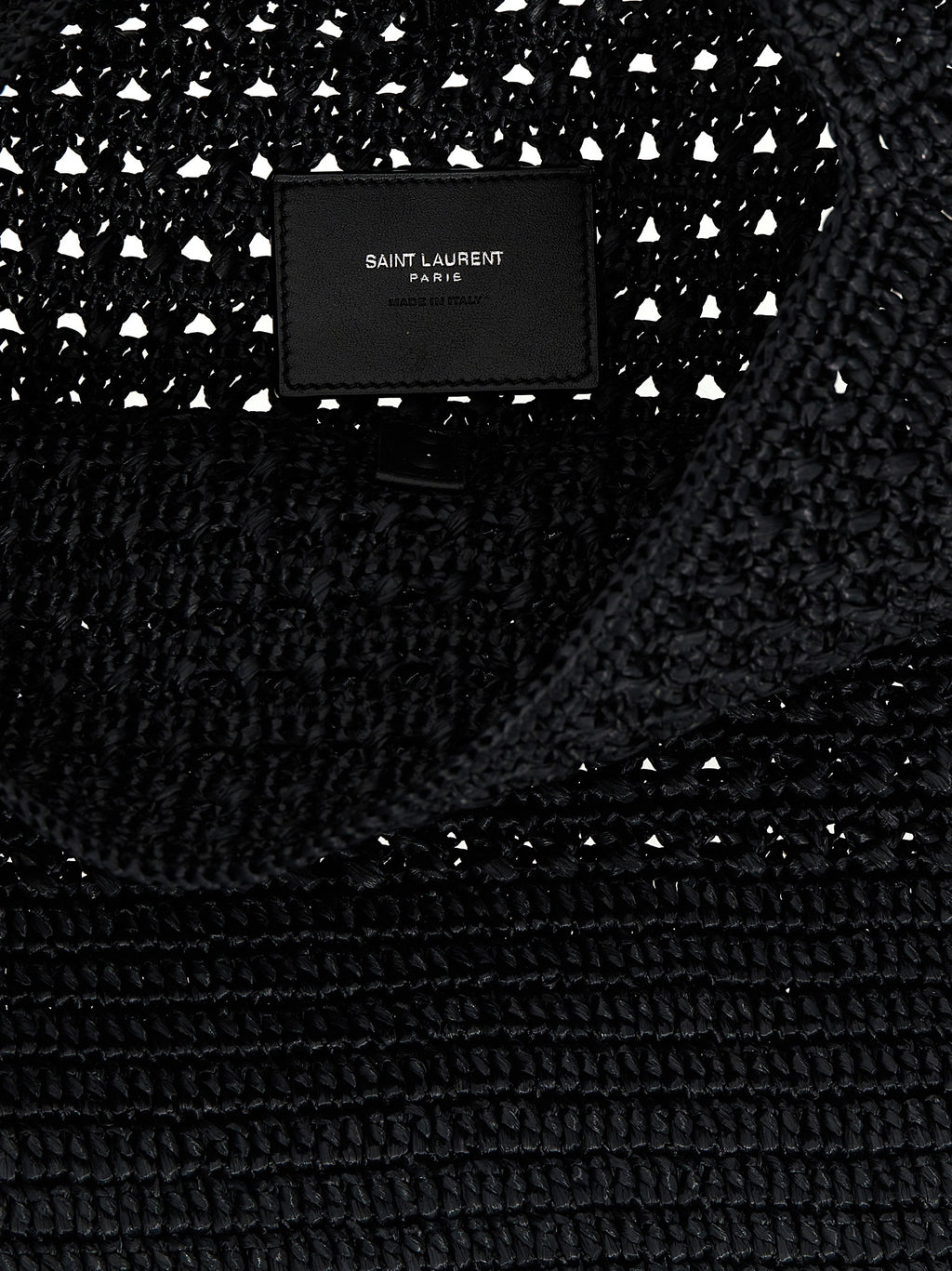 Sac cabas Saint Laurent en raffia noir avec poignées en cuir, design élégant et moderne pour un look sophistiqué.