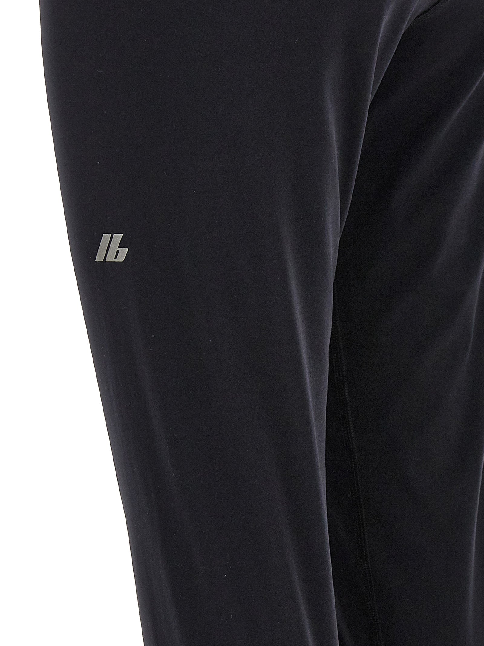 Leggings en polyamide noirs de Balenciaga, ajustés et élégants, affichant un style moderne et sophistiqué.