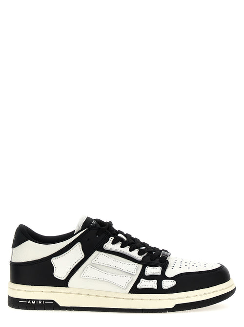 Chaussures basses bicolores Amiri en cuir, sneakers décontractés avec finition élégante et design moderne.