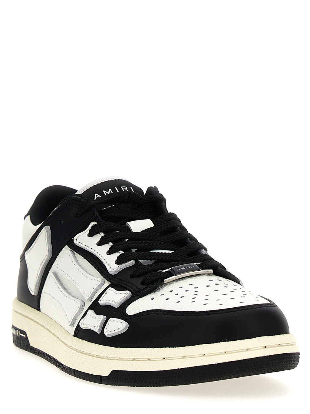 Chaussures sneakers basses en cuir bicolore Amiri, style décontracté avec semelles blanches et design moderne.
