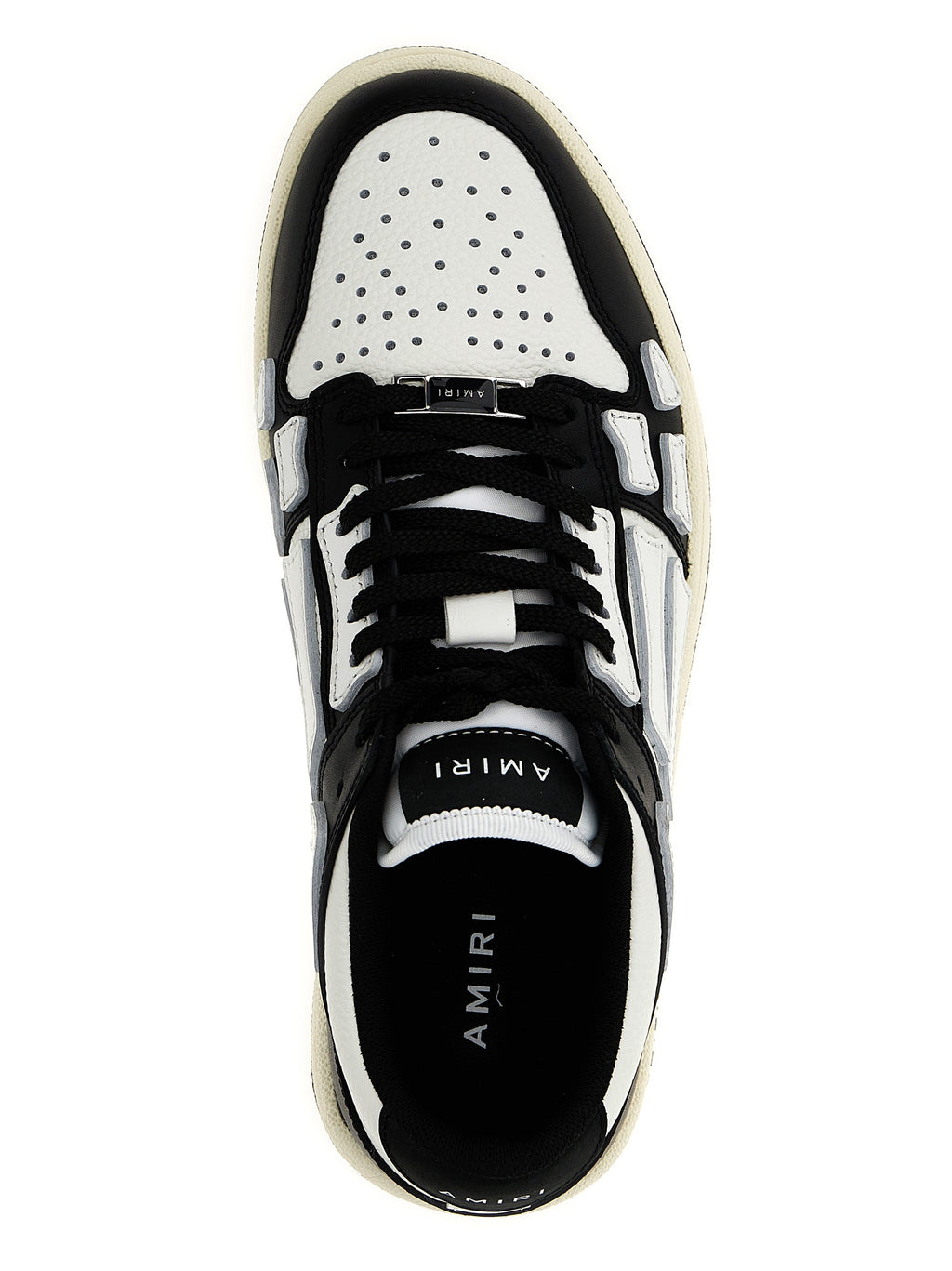 Chaussures basses en cuir bicolore Amiri, sneakers low top élégants avec design moderne et détails en cuir.