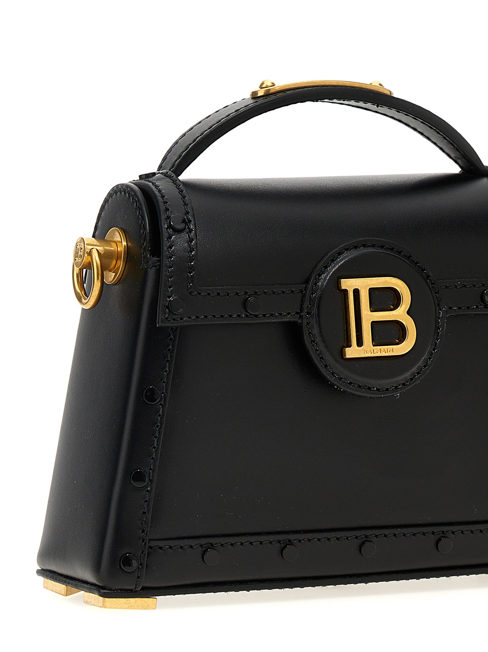 Sac à main Balmain en cuir de veau noir, élégant et sophistiqué, avec détails de design signature.