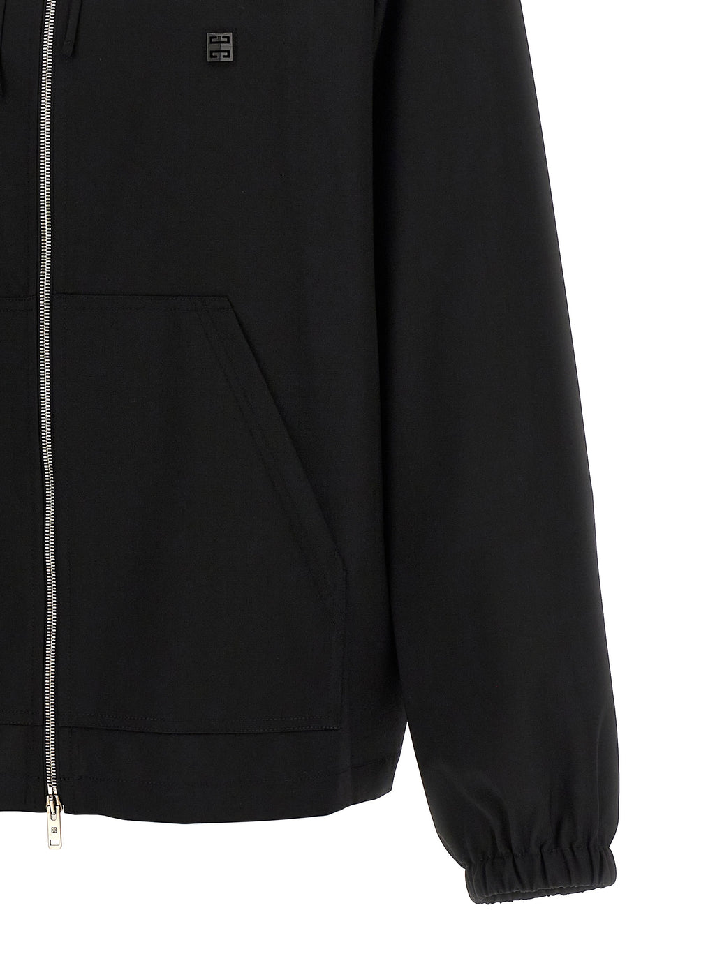 Sweat-shirt Givenchy en laine vierge noire, image montrant le design élégant et la texture douce du vêtement.