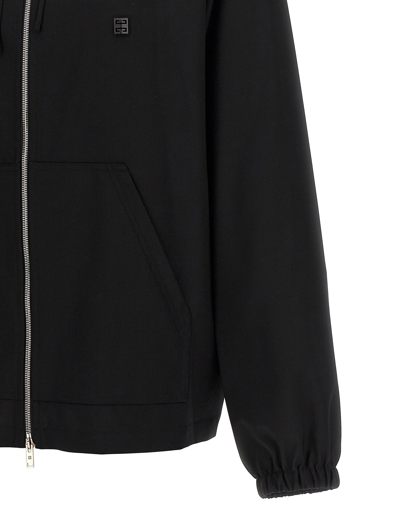 Sweat-shirt Givenchy en laine vierge noire, image montrant le design élégant et la texture douce du vêtement.